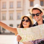 Happy tourist sightseeing city with map